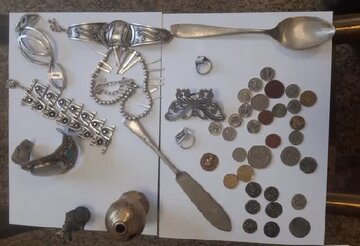 کشف دهها شیء تاریخی از مخفیگاه سارق حرفهای در خدابنده